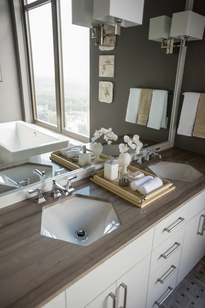 Bathroom vanity with a tray of toiletries beside the sink